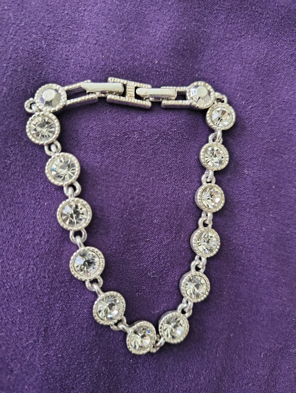 Vintage Retired Avon Round Rhinestones Silver Tone Tennis Bracelet. Estate Find.